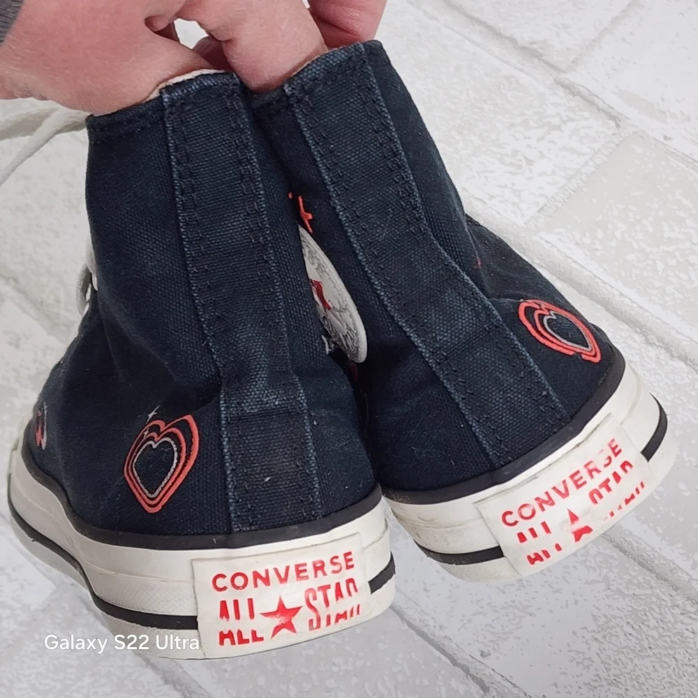Black High-Top Sneakers with Heart Details